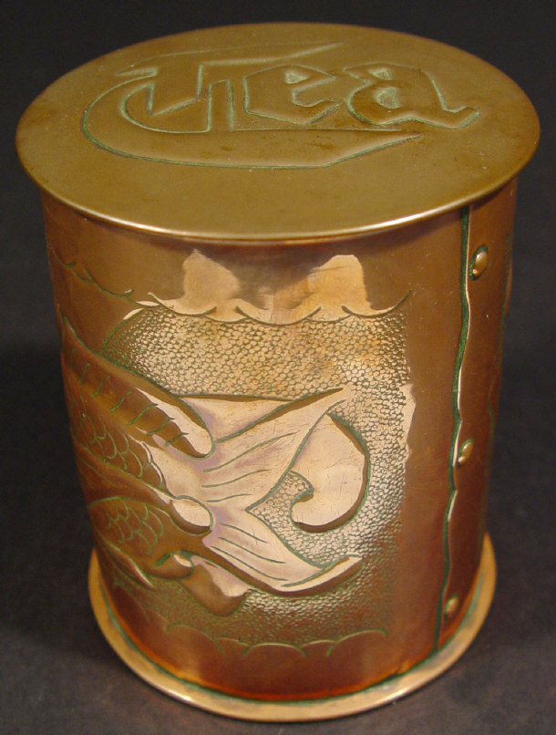 Appraisal: Newlyn cylindrical copper tea caddy embossed with stylised fish and