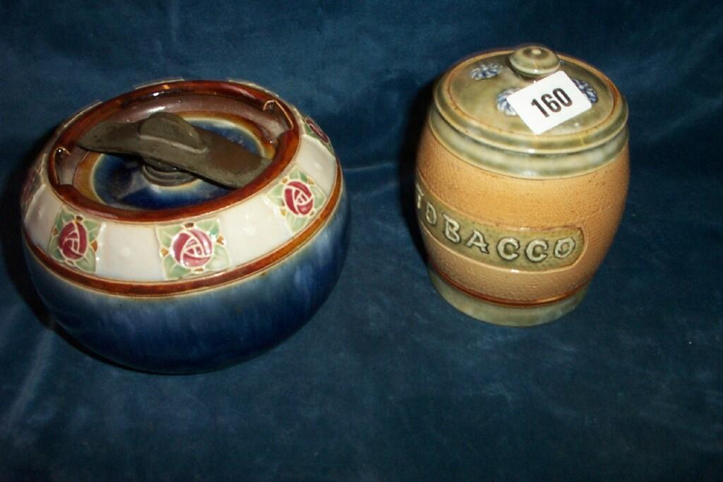 Appraisal: A Royal Doulton tobacco jar and cover with textured brown