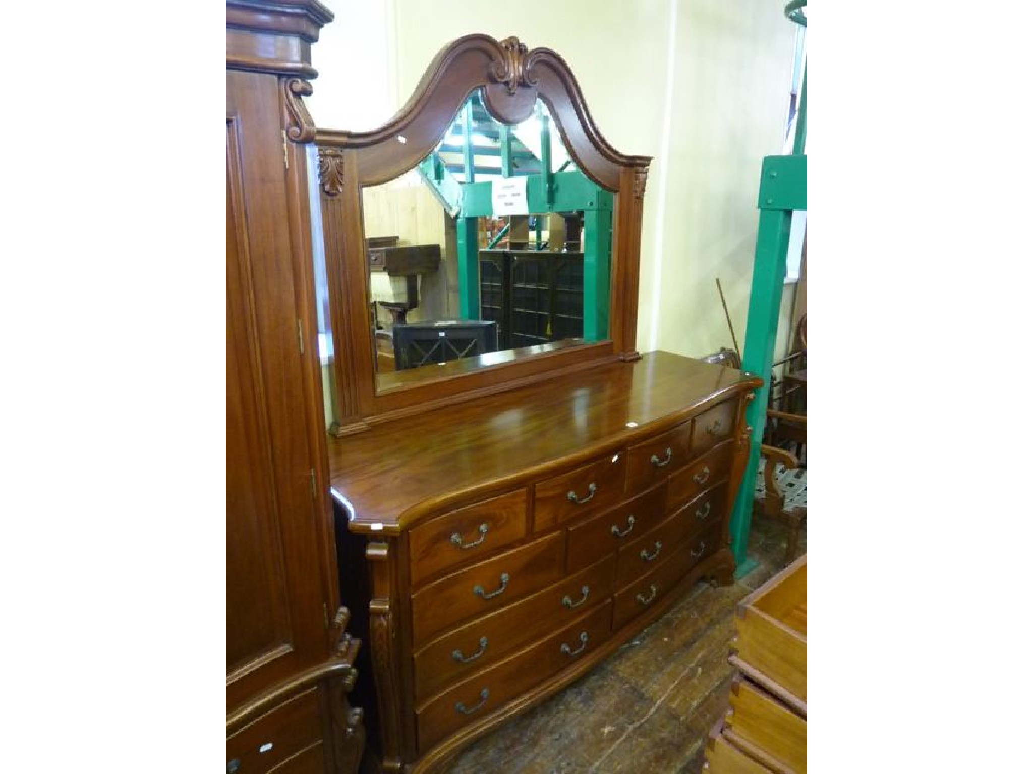 Appraisal: A substantial mahogany chest of eleven drawers of varying sizes