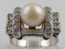 Appraisal: A white metal tests carat gold diamond and cultured pearl