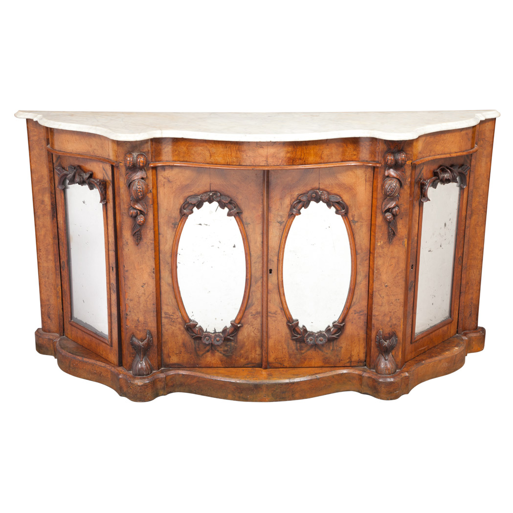 Appraisal: Victorian Walnut Side Cabinet The serpentine-shaped white marble top with