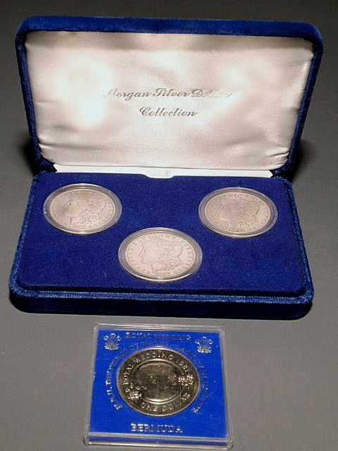 Appraisal: Three U S Morgan silver dollars- and a one-dollar commemorative