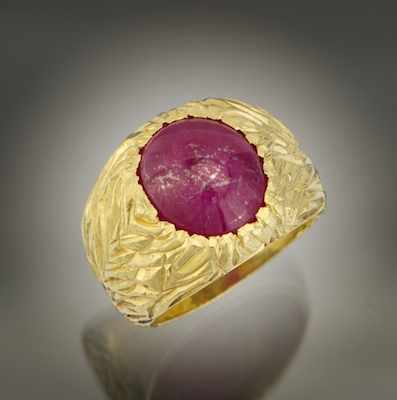 Appraisal: A Gentleman's Ruby Cabochon Ring k yellow gold mounting engraved