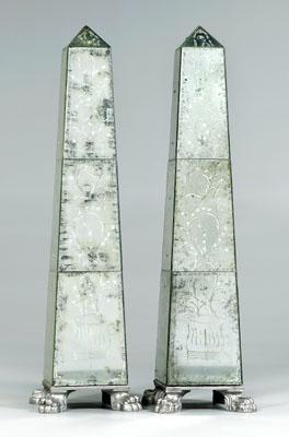 Appraisal: Pair mirror veneered obelisks each with engraved and distressed mirror