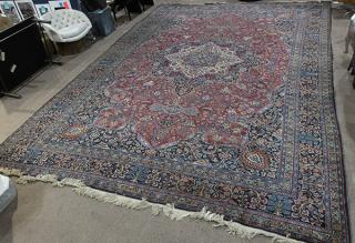 Appraisal: Signed Persian palace sized Mashad carpet ' x ' wear