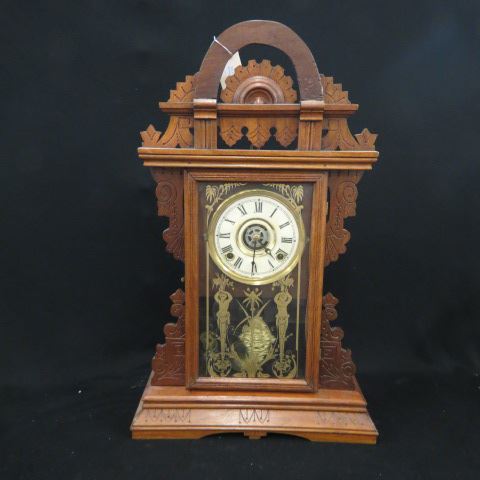 Appraisal: Ingraham Parlor Clock walnut gingerbread case with arch top alarm