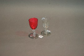 Appraisal: A toasting glass with cranberry bowl together with a glass