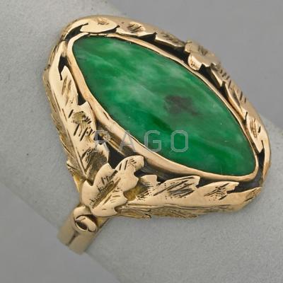 Appraisal: K YELLOW GOLD JADE RING ca Marquise-shaped jade x mm