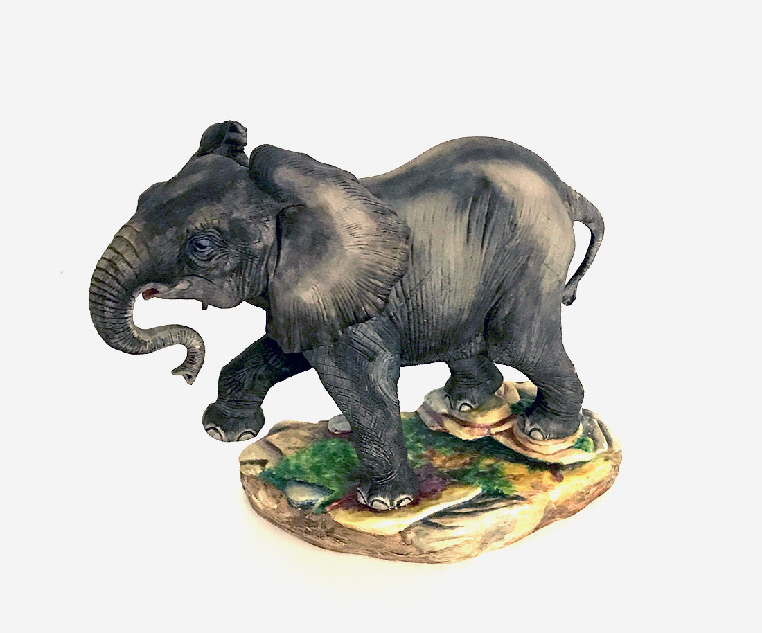 Appraisal: BOEHM PORCELAIN AFRICAN ELEPHANT FIGURE Figure of a elephant with