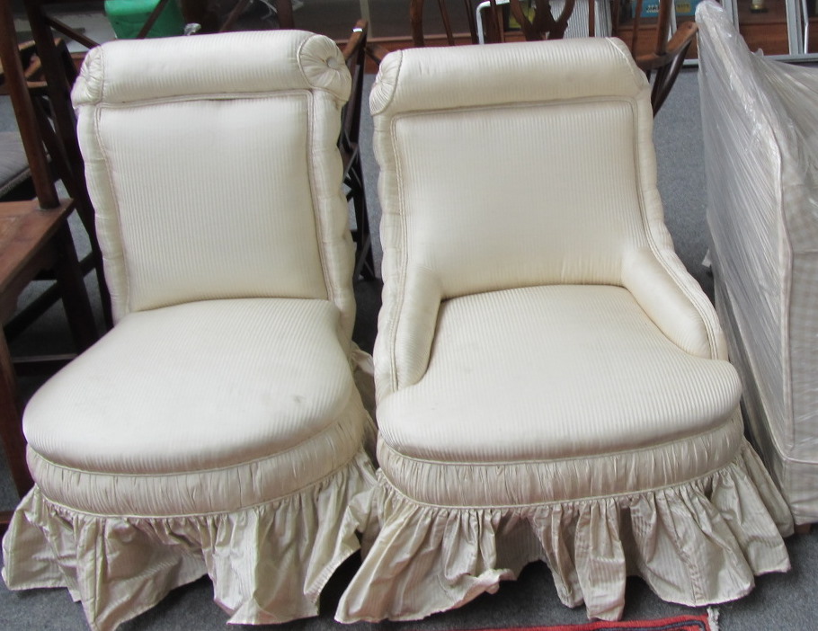 Appraisal: A near pair of th century nursing chairs on turned