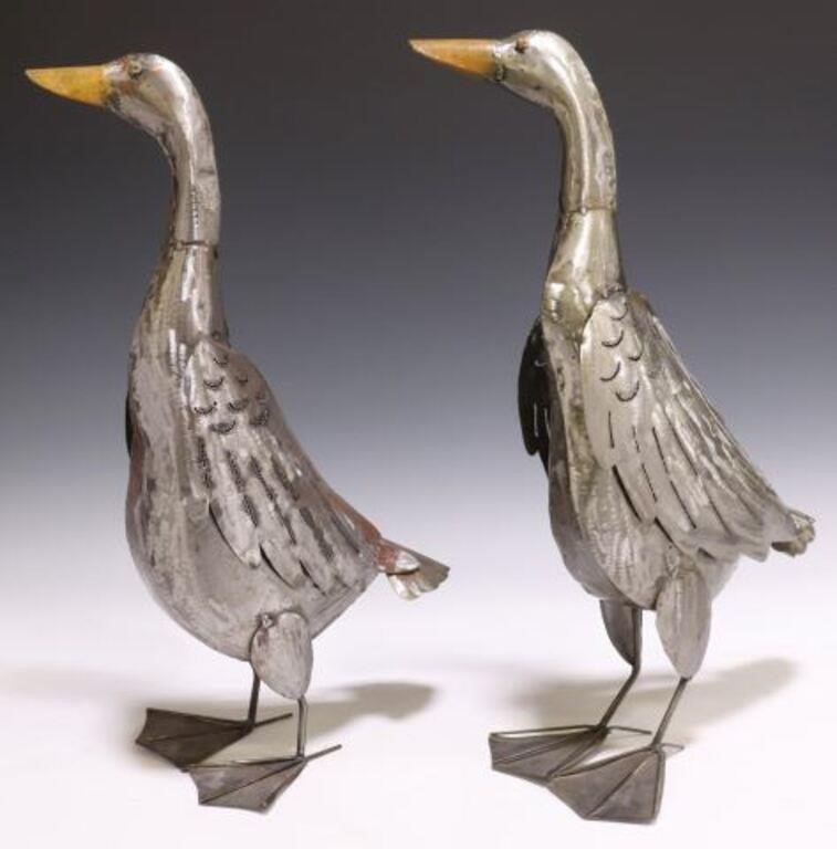 Appraisal: pair Rustic sheet metal geese sculptures late th c having