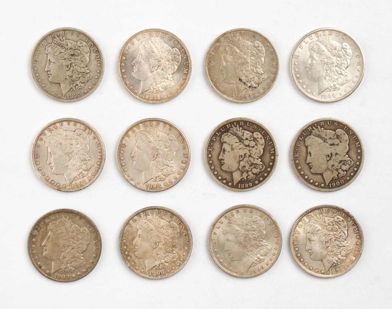 Appraisal: Twelve U S Morgan type silver dollars various dates and