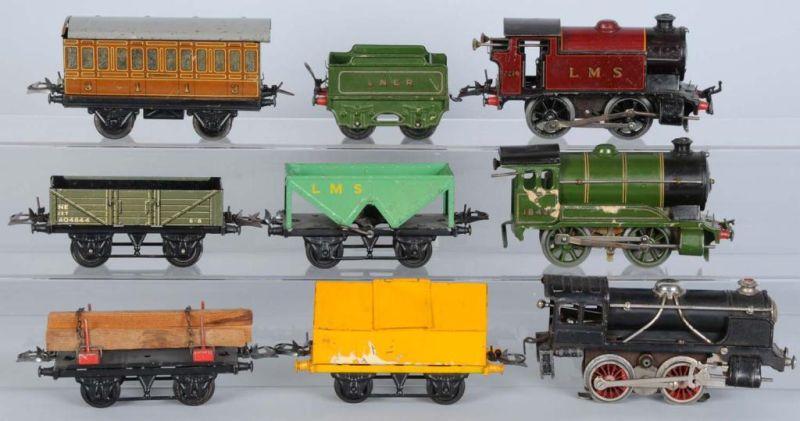 Appraisal: Lot of Hornby Locomotives Freight Cars Description Includes three locomotives