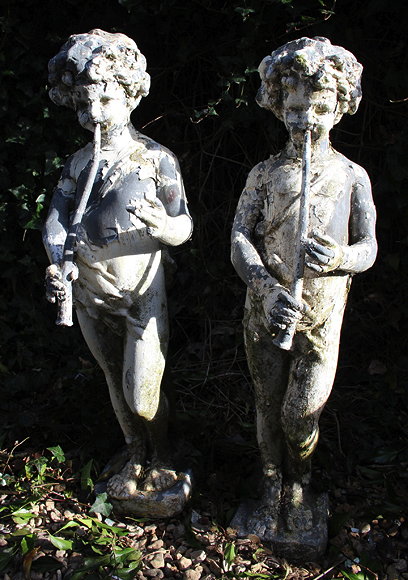 Appraisal: A PAIR OF PAINTED LEAD FIGURES of shepherd boys playing