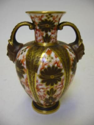 Appraisal: A CROWN DERBY PORCELAIN TWO HANDLED VASE dated of flared