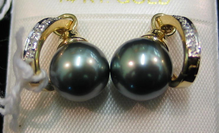 Appraisal: PAIR OF BLACK PEARL DIAMOND AND FOURTEEN KARAT GOLD EARRINGS