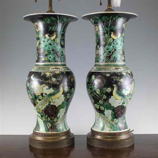 Appraisal: A pair of Chinese 'susancai' glazed biscuit porcelain yen-yen vases