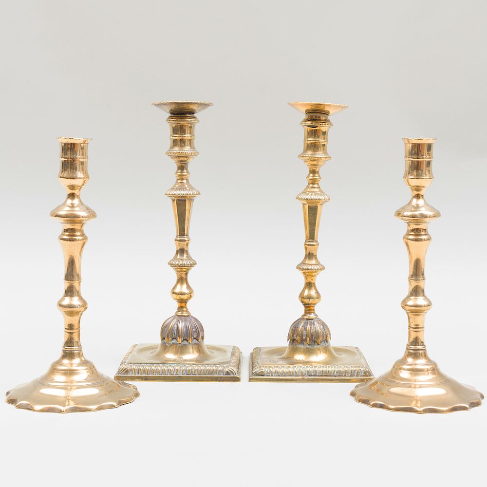 Appraisal: Two Pairs of Georgian Brass Candlesticks The tallest pair are