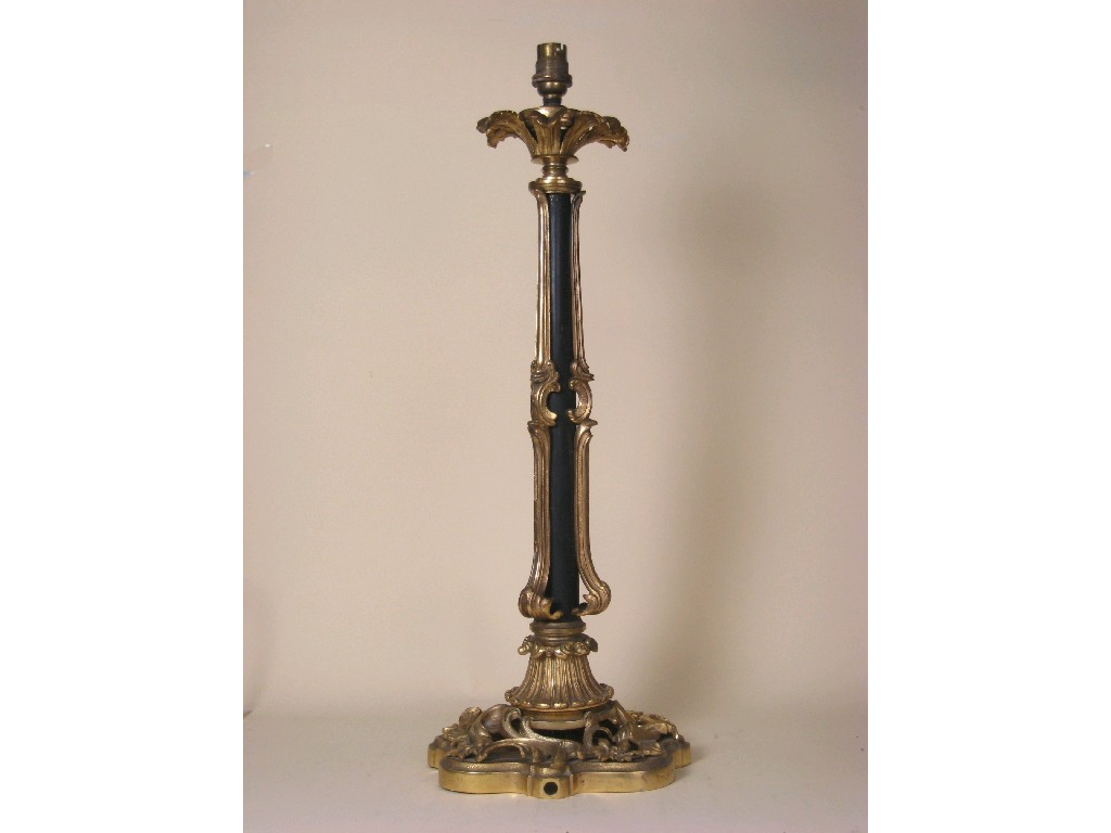 Appraisal: A large gilt brass Table lamp with ebonised column and