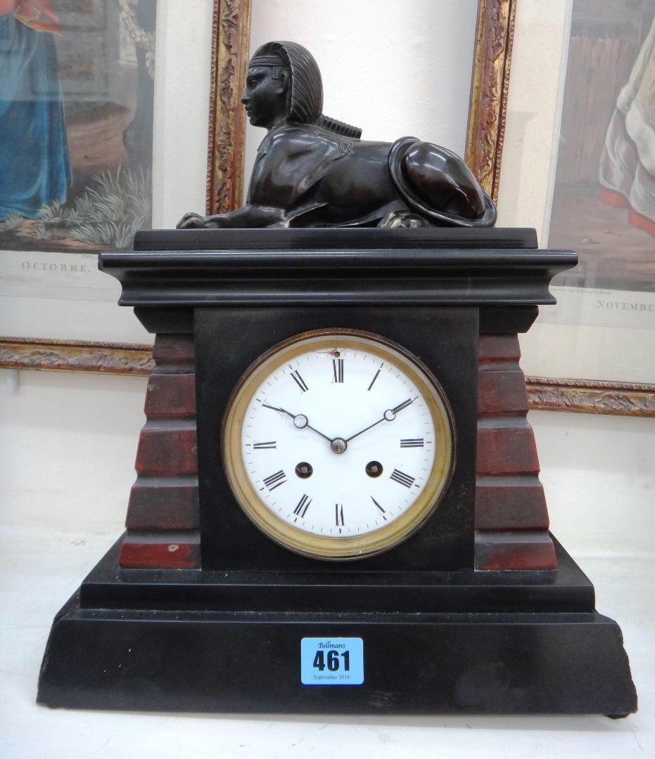 Appraisal: A French black and rouge royale marble mantel clock circa