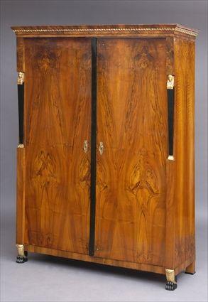 Appraisal: BIEDERMEIER ARMOIRE The doors with central ebonized strap and flanked