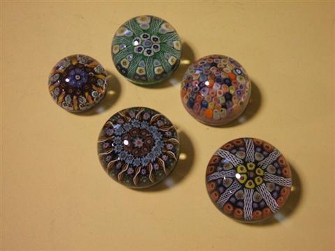 Appraisal: FOUR STRATHEARN PAPERWEIGHTS Paper labels including three patterned millefiori with