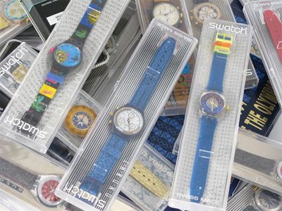 Appraisal: A collection of Swatch watches the majority in original cases