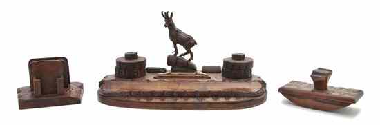 Appraisal: A Black Forest Carved Wood Three-Piece Desk Set comprising a