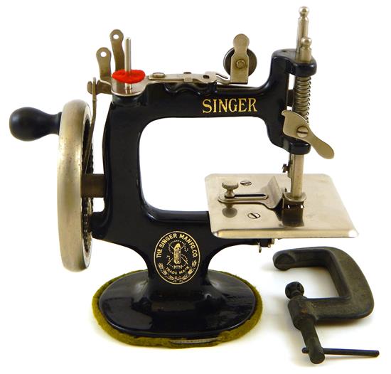 Appraisal: Singer for the Girls sewing machine circa miniature table-top model