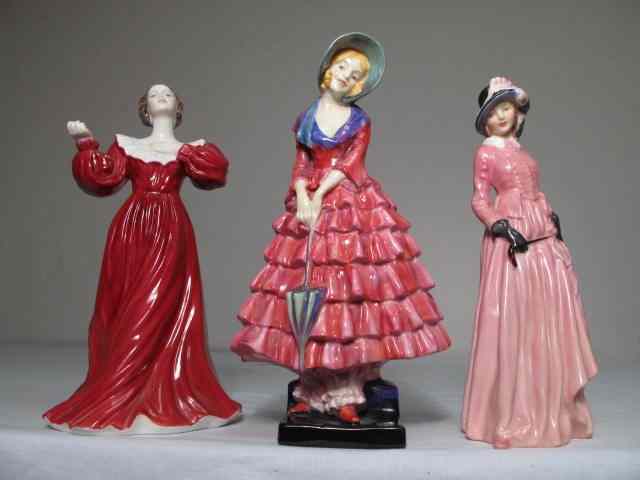 Appraisal: Lot of three English porcelain figurines Includes two Royal Doulton