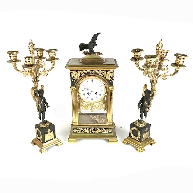 Appraisal: Neoclassical-Style -Piece Garniture Set Three-piece neoclassical-style garniture set comprising clock