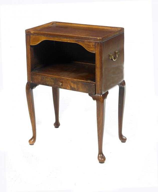 Appraisal: A MAHOGANY BEDSIDE CUPBOARD with galleried top and a drawer