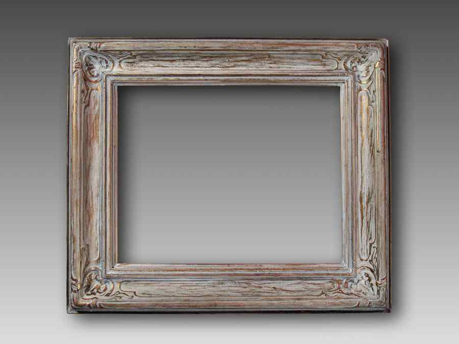 Appraisal: CARVED AND GILDED NEWCOMB MACKLIN FRAME Minor wear matching liner