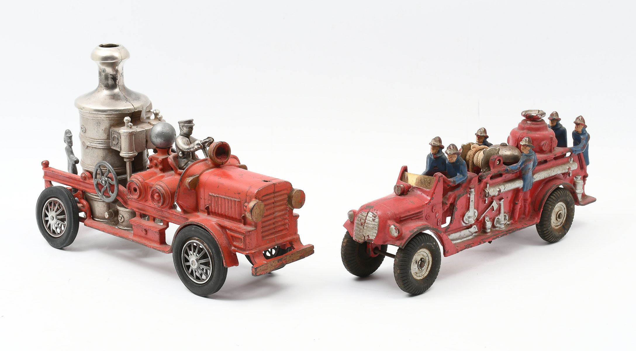 Appraisal: PC HUBLEY ARCADE CAST IRON TANKER FIRE TRUCKS Hubley cast