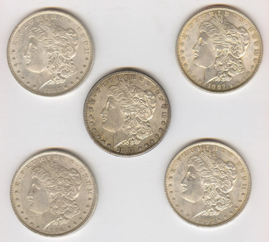 Appraisal: FIVE ESTATE MORGAN SILVER DOLLARS Estate coins - S -