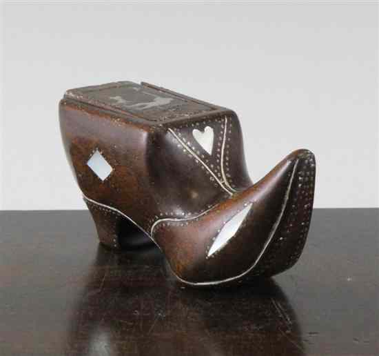 Appraisal: A th century French mother of pearl inlaid walnut shoe