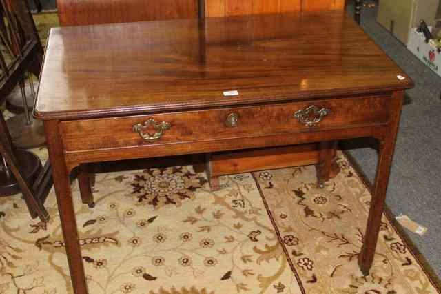 Appraisal: A GEORGIAN MAHOGANY SIDE TABLE fitted with single frieze drawer