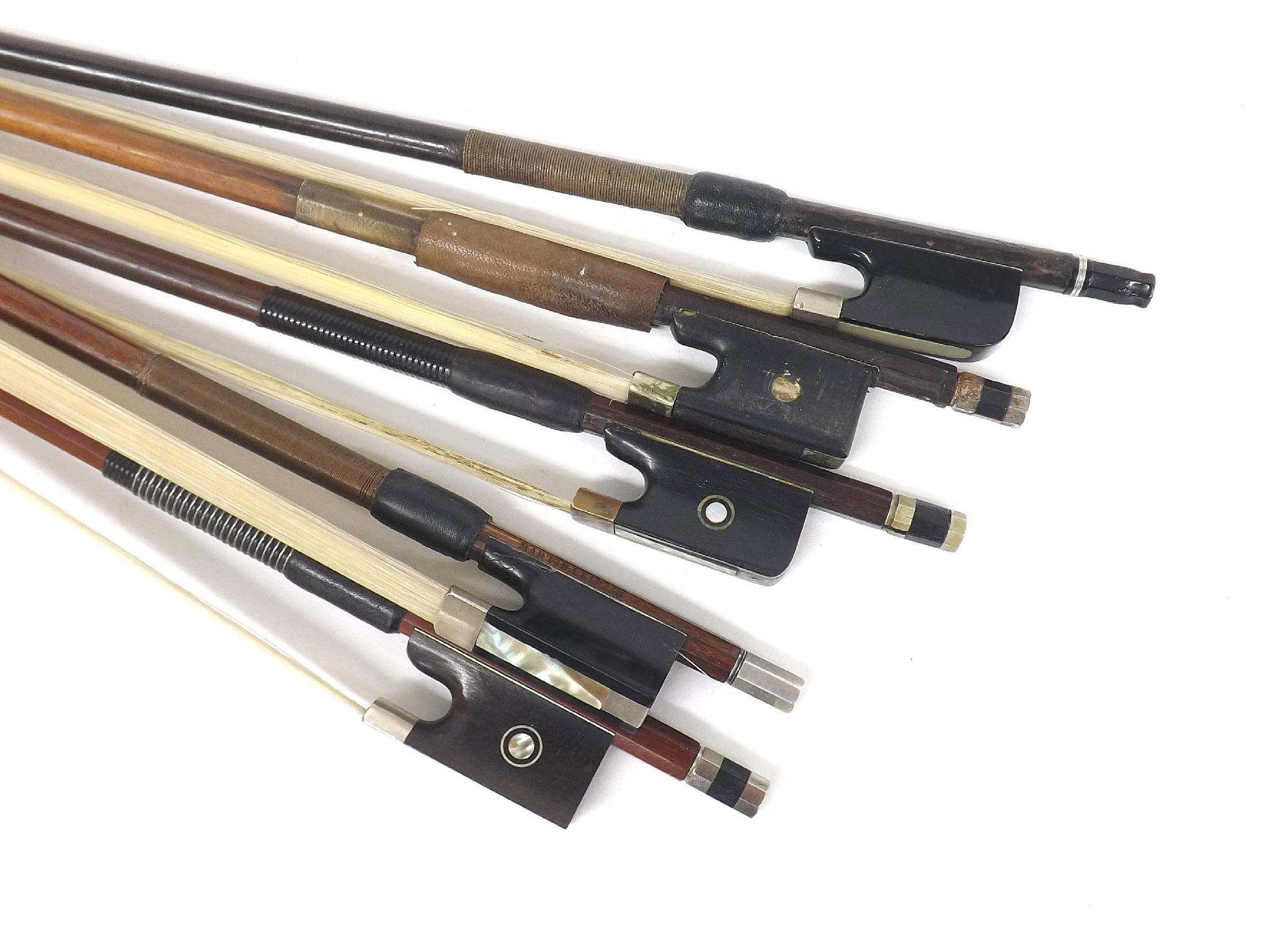 Appraisal: Five various violin bows including one silver mounted stamped Martin