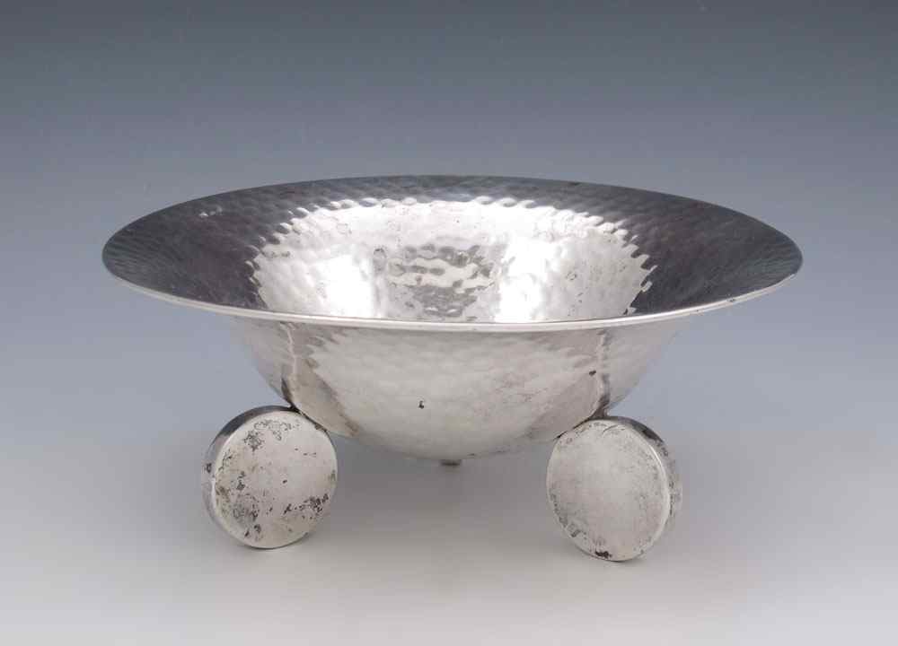 Appraisal: POLISH SILVER ARTS CRAFTS BOWL Hand hammered with three large