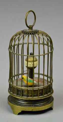 Appraisal: th Century Birdcage Novelty ClockClock having a small bird that