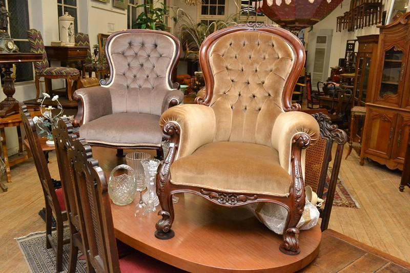 Appraisal: TWO MATCHING VICTORIAN STYLE GENTS CHAIRS IN LIGHT BROWN UPHOLSTERY