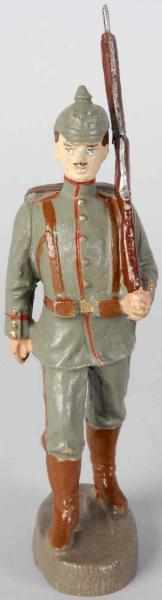 Appraisal: Elastolin mm German Marcher Large composition soldier in great condition