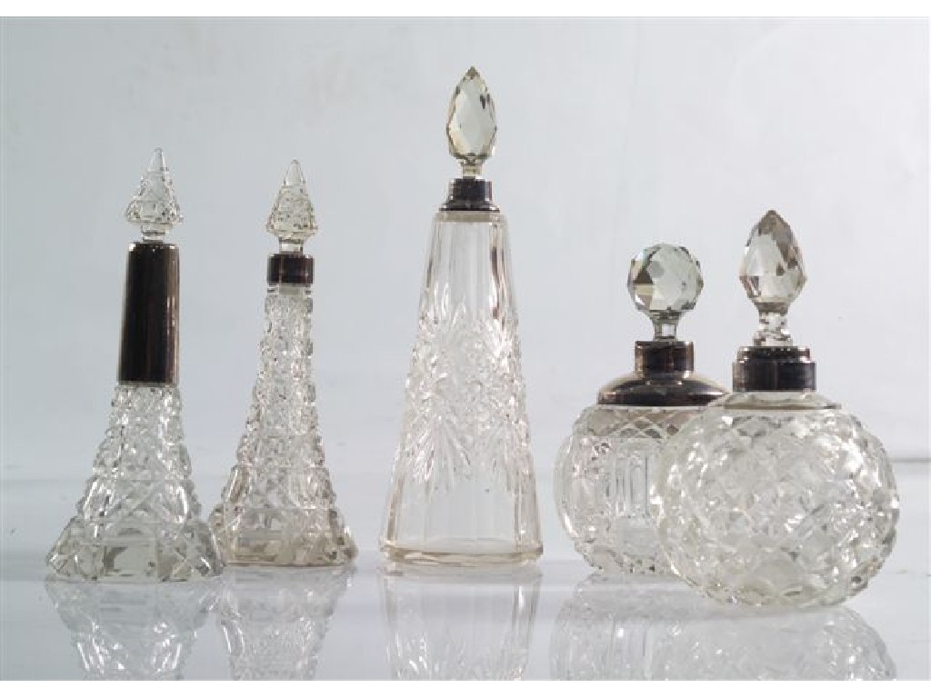 Appraisal: GROUP OF FOUR VICTORIAN AND LATER SILVER-MOUNTED CUT-GLASS SCENT BOTTLES