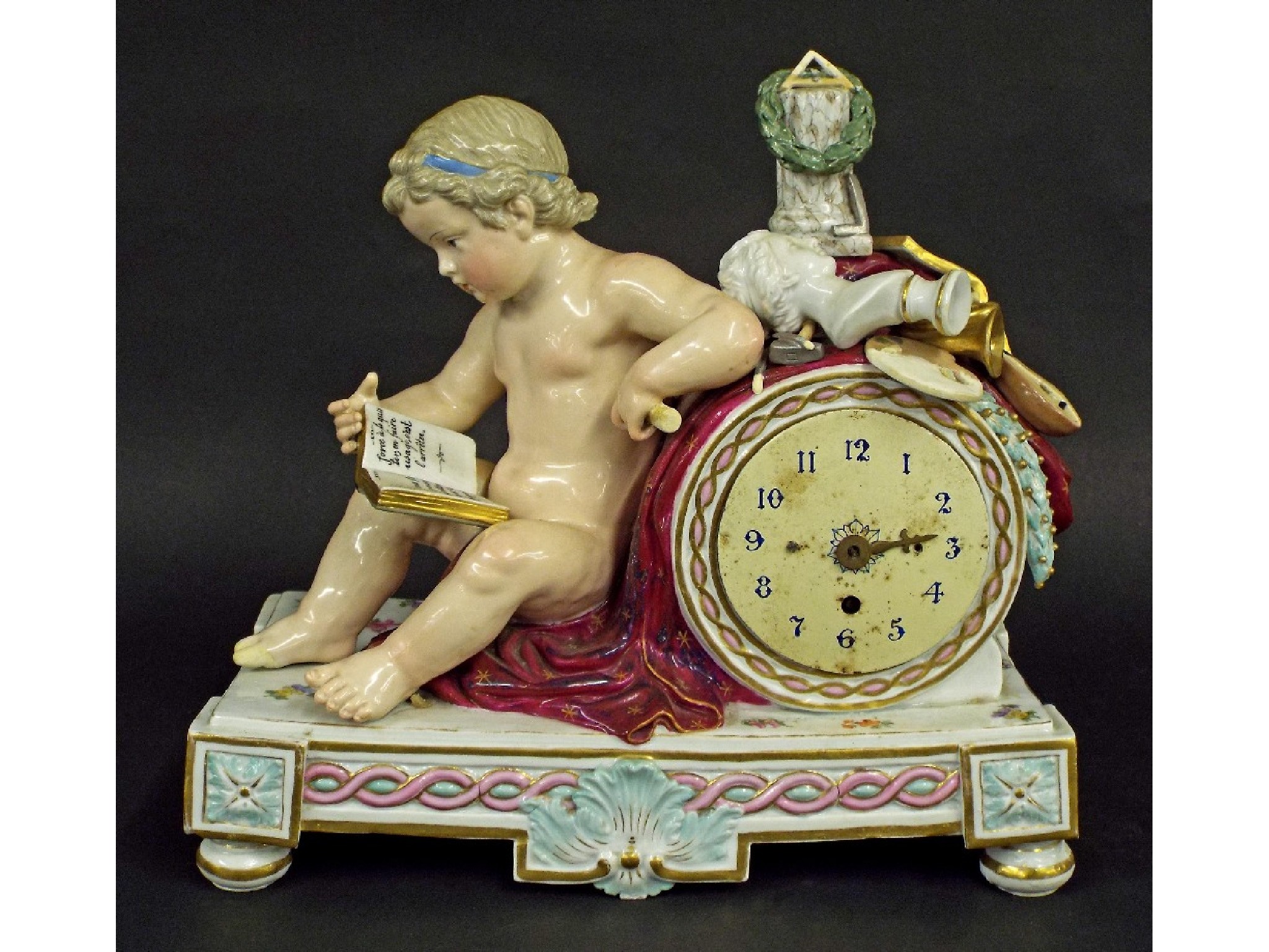 Appraisal: Porcelain figural mantel clock in the form of a cherub