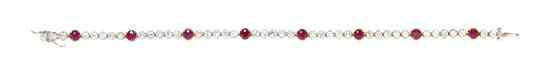 Appraisal: An Karat Gold Diamond and Ruby Tennis Bracelet containing round