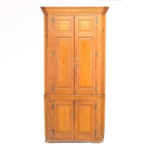 Appraisal: American pine corner cupboard late th c with two over