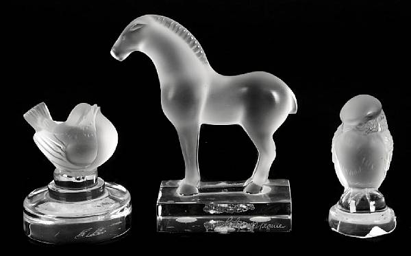 Appraisal: A group of eight Lalique molded glass decorative articles comprising