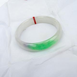 Appraisal: Chinese White to Green Jade Bangle Bracelet Unsigned Good condition