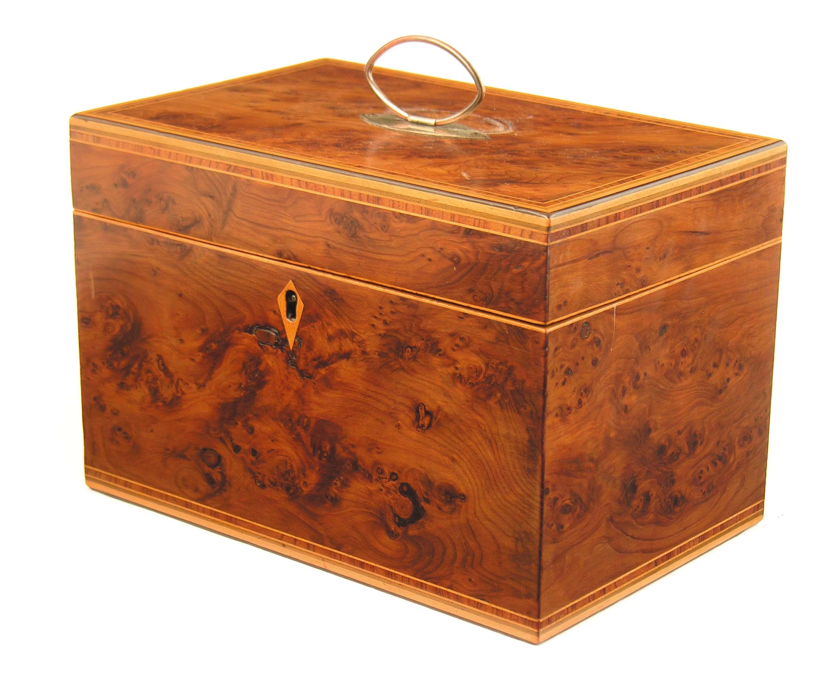 Appraisal: A late George III burr yew tea chest