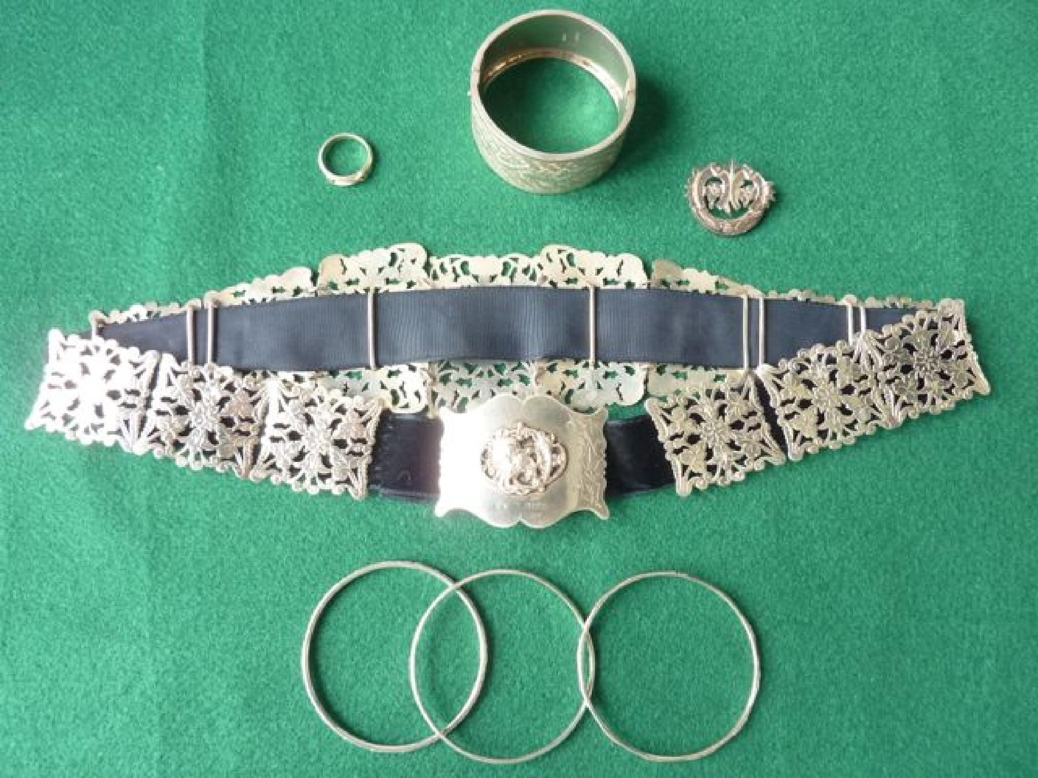 Appraisal: A silver bangle Art Nouveau belt with panels the buckle